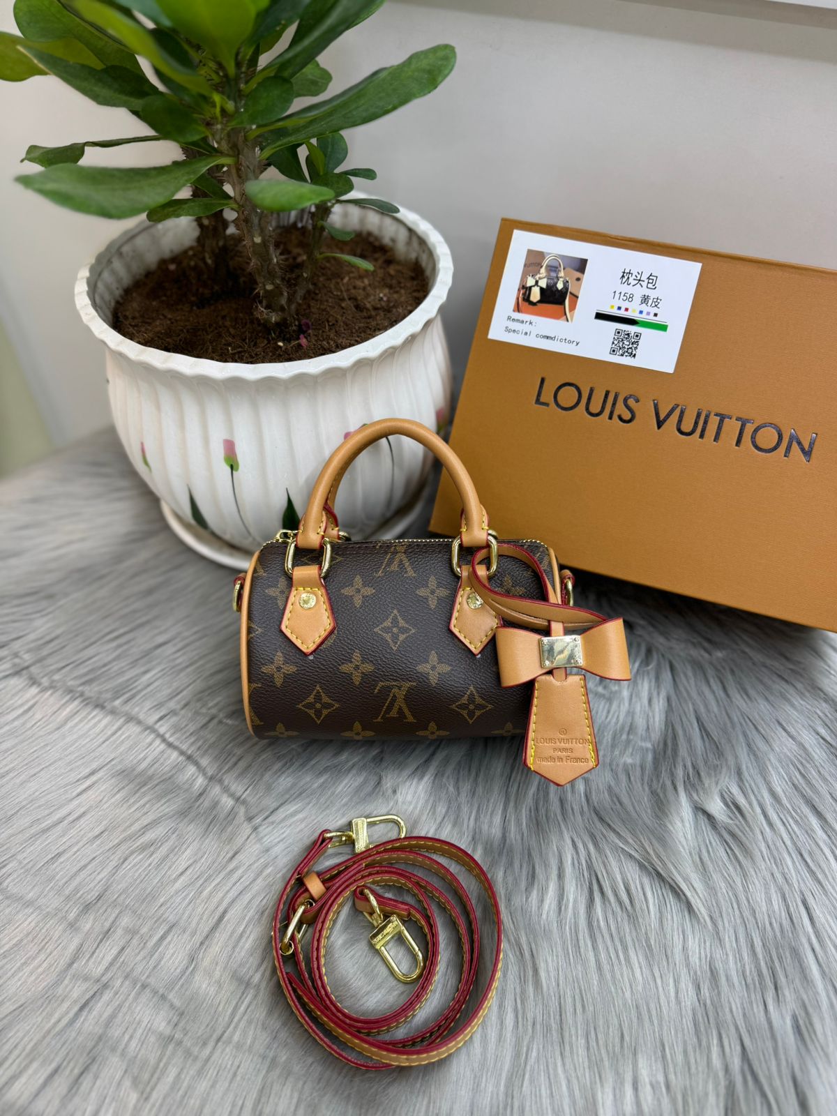 Louis Vuitton – Monogram Nano Speedy Bag (Bow Detail)