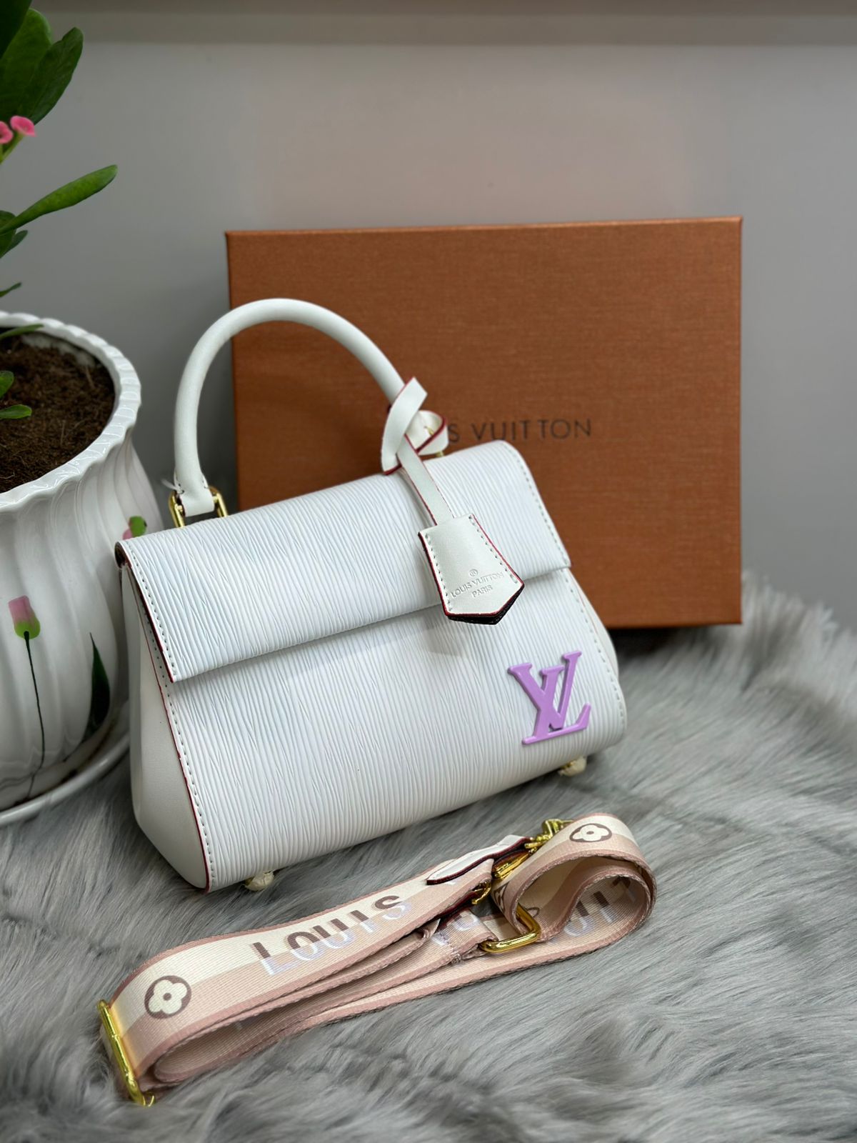 Louis Vuitton – Epi Leather Top Handle Bag (White & Lilac)