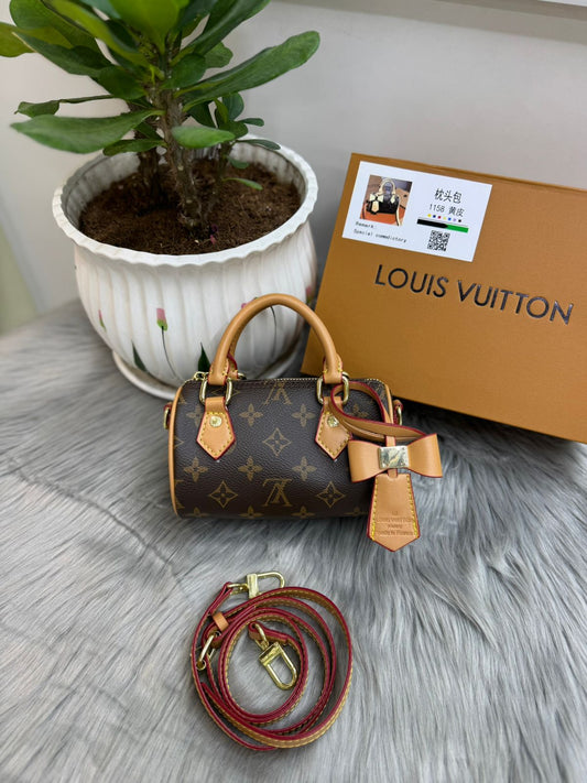 Louis Vuitton – Monogram Nano Speedy Bag (Bow Detail)