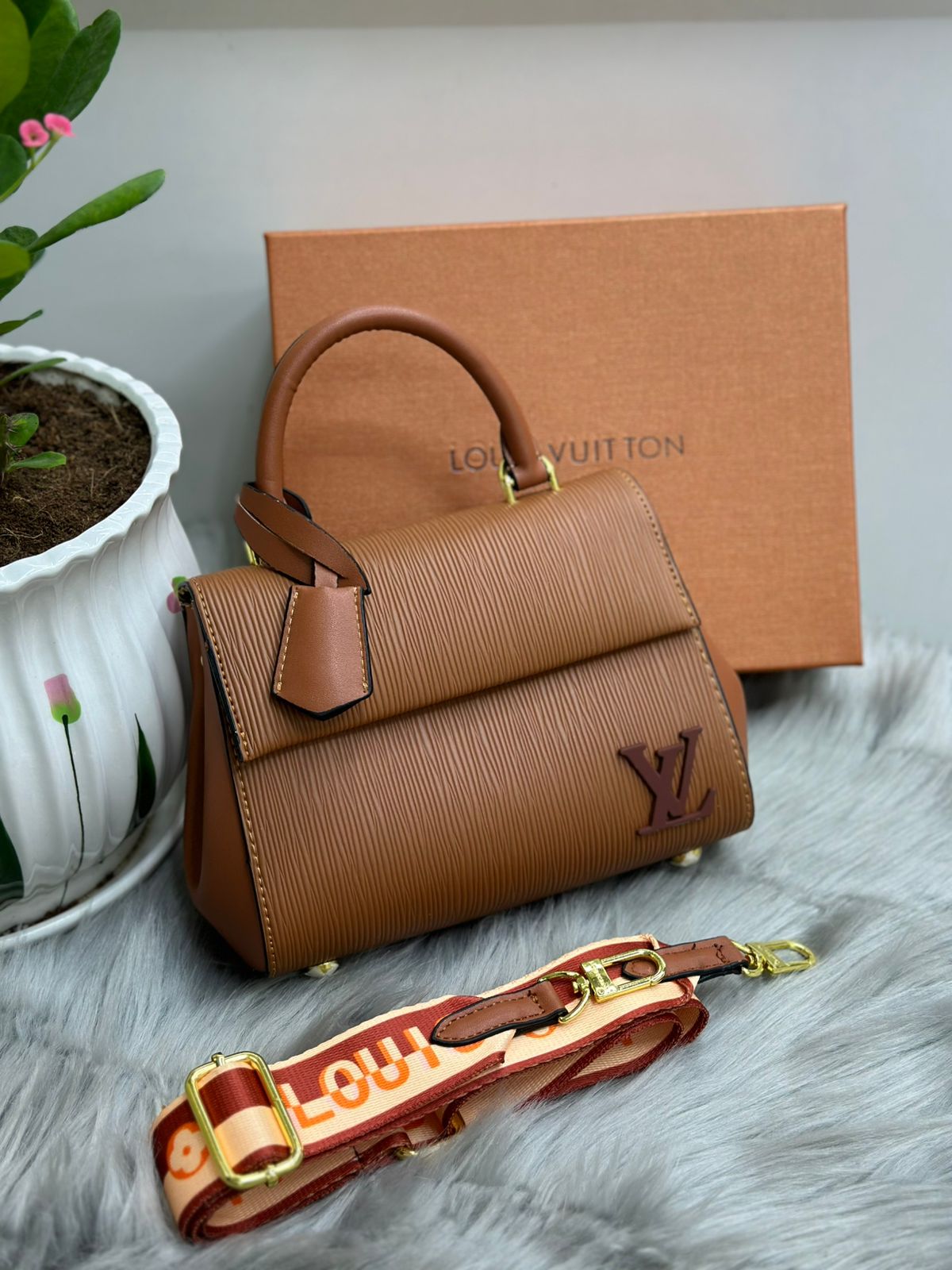 Louis Vuitton – Epi Leather Twist Top Handle (Brown)