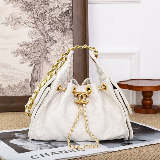 Chanel – Quilted Drawstring Bucket Bag (White with Gold Hardware)