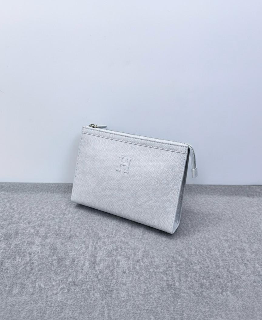 Hermès “H” Embossed Leather Pouch – Classic White Edition