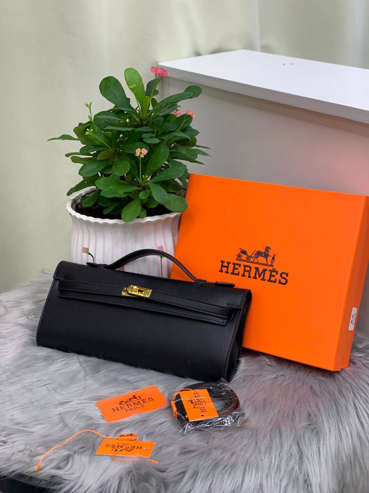 Hermès – Kelly Cut Hand Wallet